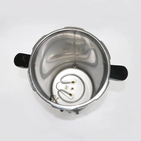 Stainless steel autoclave inner chamber with wired heater and mounting plate; side handles visible