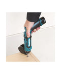 Hand holding Super Compact Cordless Pencil Drill Offering Slick Ratchet Action And 21 Position Torque Control tightening a screw.