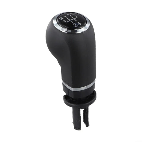 Sleek Black And Silver Manual Gear Shift Knob For Opel Cars Perfect Upgrade For 5 Or 6 Speed Manuals Simple DIY Install No Tools Needed To Spice Up Your Ride Today. Black and silver plastic and metal manual gear shift knob for Opel cars, top view.