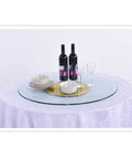Clear Glass Lazy Susan Turntable For Dining Tables And Kitchens with dishes and wine, round rotating tray, easy clean.