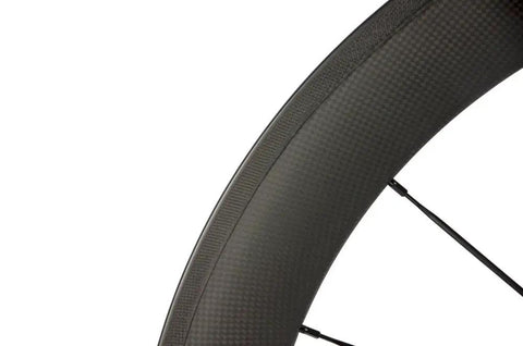 Close-up of Carbon 700c Clincher Wheelset For Road Bikes, 23mm Rim Width, Toray T700 Carbon Fiber, Shimano Compatible
