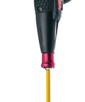 Gloved hand holding Electric Ball Grip Screwdriver with One Bit, 3.6V Li Ion Battery, featuring aluminum sleeve chuck.