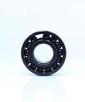 Top Shelf Two Piece High Temperature Deep Groove Ball Bearings 35X80X21Mm TB6307 Series front view showcasing black steel bearing design.