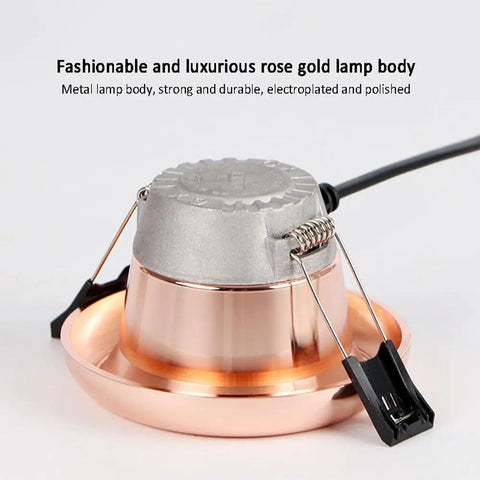 saditesdk 15 Pack Recessed Lighting Housing Trim Kits Rose Gold Led Ceiling Lamp Anti-Glare Led Downlights close-up of metal lamp body with rose gold finish