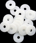 20 Pc Nylon Flat Washers Electrical Components Faucet Repair Kit Heavy Duty Fasteners Non Conductive And Sturdy Hardware For Home Projects on black background.