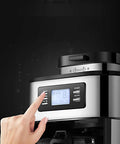 Hand adjusting controls on the Legit Automatic Drip Coffee Maker With Built In Burr Grinder Smart Temp Control.