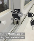 Rock Solid Heavy Duty Latch Kit on door with keys, black aluminum bolt lock, secure for sliding or hinged doors.