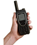 Tough As Nails Heavy Duty Satellite Communicator With Military Grade Armor And Massive Battery Pack in a hand for outdoor use.