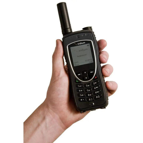 Tough As Nails Heavy Duty Satellite Communicator With Military Grade Armor And Massive Battery Pack in a hand for outdoor use.