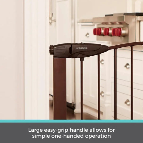 Stone Arch Auto Close Baby Gate For Doorways Bronze Metal Safety Gate with easy-grip handle in kitchen doorway