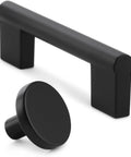 Matte Black Cabinet Knob One And Three Eighths Inch Diameter Versa Drawer Handle For Cabinets And Furniture shown