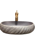 USZWBY Vessel Sinks Bathroom Vessel Sink Washbasin Ceramic Art Countertop Basin with a modern round design and gold faucet.