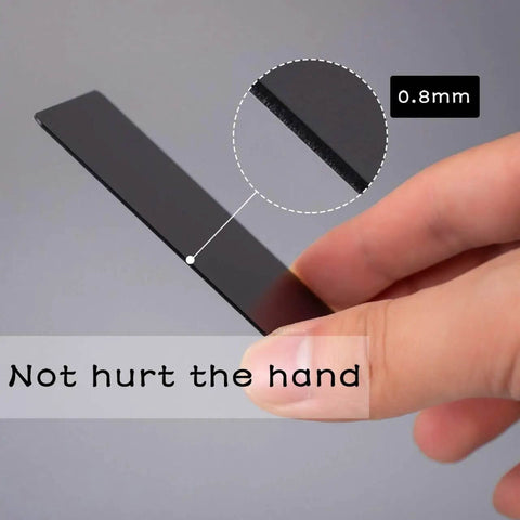 Close-up of Pro Grade Thick Black Anodized Aluminum Business Card 0.8mm with focus on edge thickness and smooth finish in hand.