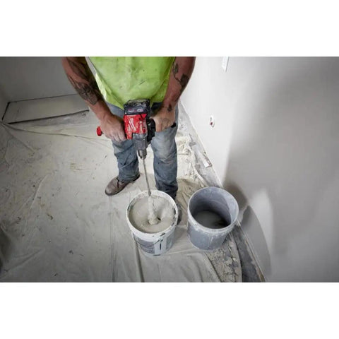 18V Cordless Mud Mixer Bare Tool for Drywall Mud Plaster and Concrete Projects being used on a floor with plaster mix