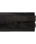 Side view of a black motor start capacitor with visible labels and wiring connectors.