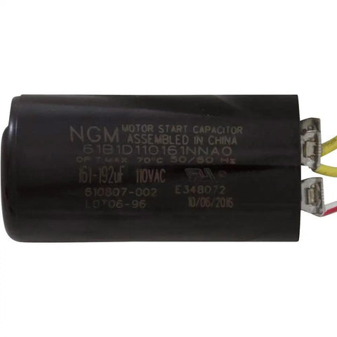 Side view of a black motor start capacitor with visible labels and wiring connectors.