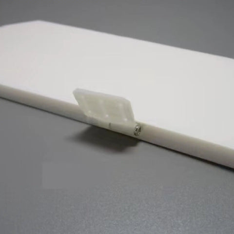 Six Piece Nylon Hinges Kit For RC Aircrafts Small To Large Easy Install shown on hinge attached to white panel