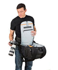 Person holding Flipside 500 AW II Camera Backpack For Pro DSLR And Mirrorless Gear Fits 400mm Or 500mm Lens Space For 1 To 2 Bodies