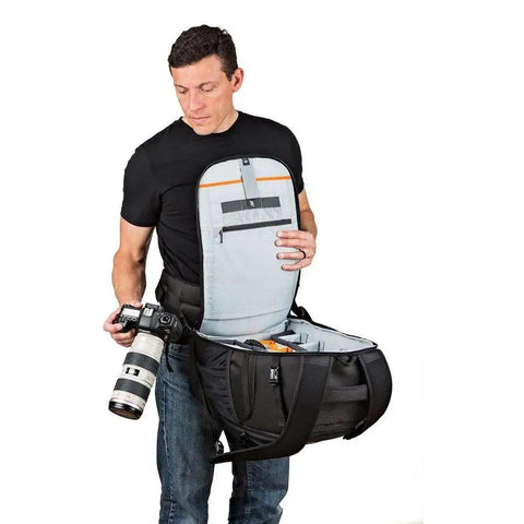 Person holding Flipside 500 AW II Camera Backpack For Pro DSLR And Mirrorless Gear Fits 400mm Or 500mm Lens Space For 1 To 2 Bodies