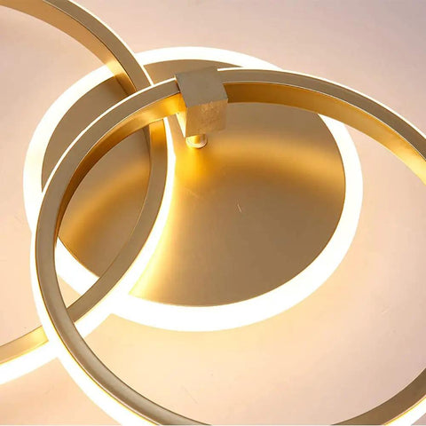 Modern 76W LED Chandelier Four Ring Flush Mount Ceiling Light close-up with illuminated acrylic rings and gold finish