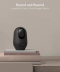 2K Baby Monitor With AI Motion Tracking Two Way Audio WiFi Indoor Camera on books, SD or cloud storage option