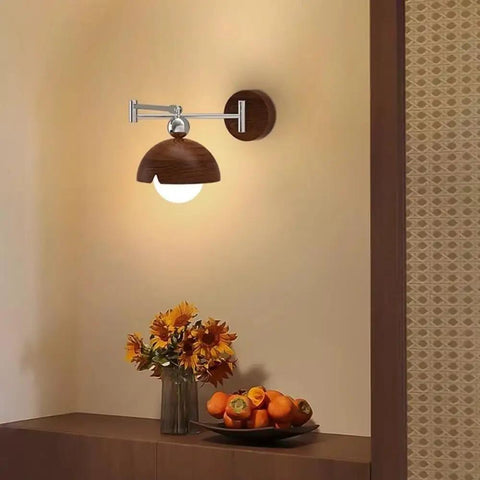 Swing Arm Wall Sconce, Modern Wood Lamp Bedside Reading Bedroom with dome shade and polished chrome arm, illuminating a warm space.
