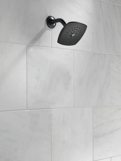 Matte Black Universal Shower Arm Replacement For RP6023BL With Durable Brass Build installed on white tile wall