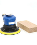 Auto Body Polisher And 5 Inch Palm Pneumatic Orbital Sander For Woodworking, Pro Grade Industrial Power Tool NT 301 next to wood block