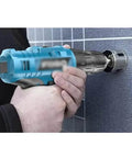 Premium Multifunctional Cordless Electric Drill Kit Featuring Badass Torque Copper Core Motor Quick Charge Battery Life about to drill into wall