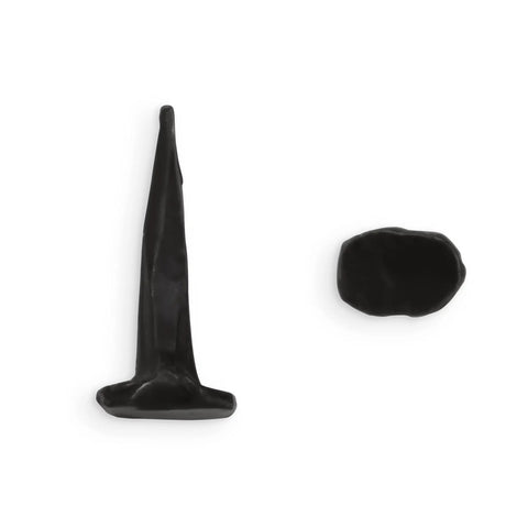 Solid As A Rock Half Inch Black Steel Upholstery Tacks To Nail Down Muslin And Fabric Covers Smooth Dome Heads on white background.