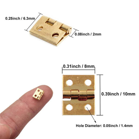 Close-up of brass miniature hinge, 0.39 x 0.31 in, part of Miniature Brass Hinges Set With 20 Pieces 1 x 0.8 Cm Folding Butt Hinges Plus 80 Replacement Nails.