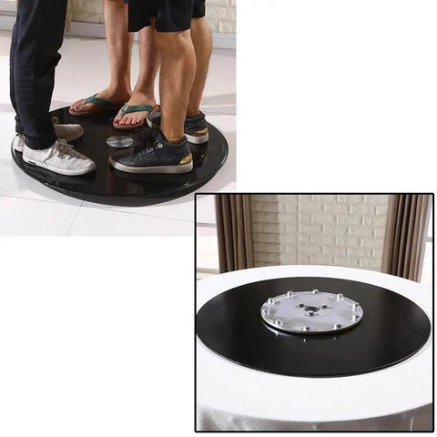 Heavy Duty 40 Inch Black Tempered GlassLazy Susan Turntable on floor with people standing, showcasing smooth rotation functionality.