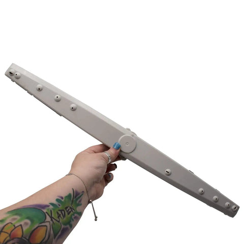 Hand holding Dishwasher Lower Spray Arm Replacement W10319027 WPW10319027 AP6019436 PS11752743, showing length and design.