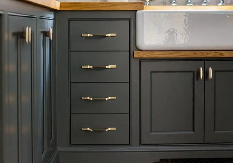 Six Pack Champagne Bronze Cabinet Knobs And 2.2 Inch Modern Gold Bar Pulls on dark kitchen cabinets by sink