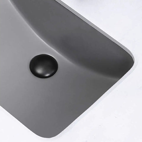 Straight Up Heavy Duty Ceramic Sink, Square Under Counter Wash Basin, close-up of deep gray bowl with drain.