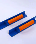 Built To Last Self Adhesive Sandpaper Frame Holder For Woodworking And Grinding With Grippy Non Slip Handle For Quick Pad Swaps And Smooth 30 Cm Corner Sanding That Gets Work Done Quick, blue plastic frame with orange grips.