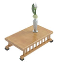 Table with vase on top using bed stopper and furniture stopper caster cups to prevent movement and scratches