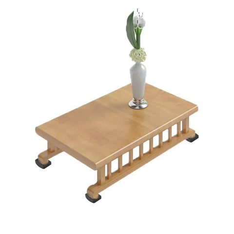 Table with vase on top using bed stopper and furniture stopper caster cups to prevent movement and scratches