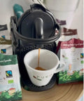 Organic Coffee Pods Compatible With Nespresso Original Machines Variety Pack Of Six Fairtrade Blends In BPA Free Compostable Capsules 60 Pods Intensities 4 Through 9 Toxin Tested Cafe Quality At Home Eco Friendly Convenience with coffee machine and cup