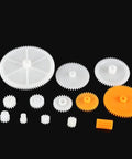 Awesome 200 Piece Plastic Gear Set for DIY Robots and Toys including various gears on black background