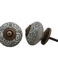 Straight Up Premium White Ceramic Drawer Knobs 50 Pack Round Crackle Dresser Pulls For Kitchen Cabinets in gray with floral design and brass base.