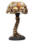 Light Up Skeleton Table Lamp With Four Bone Skull Design, LED 3D Skeleton Night Light, spooky head-on view with LED glow