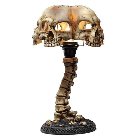 Light Up Skeleton Table Lamp With Four Bone Skull Design, LED 3D Skeleton Night Light, spooky head-on view with LED glow