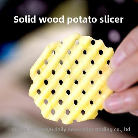 Crinkle-cut potato and vegetable slicer disc, round yellow plastic, handheld kitchen gadget