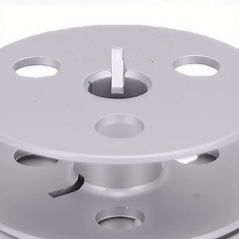 Close-up of Heavy Duty Four Hole Aluminum Bobbin With Cnc Machined Precision Balance for Durkopp industrial sewing.