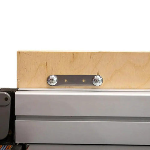 Heavy Duty Flex Stock Guides For Table Saws And Router Tables With Smooth Infeed And Outfeed Rollers Snap Tight Knobs And Flexible T Bolt Mounts For Dead Straight Cuts On Every Cut, showing a mounted wooden block with metal bracket on a table saw.