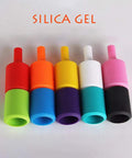 Colorful silica gel bottle stoppers in red, orange, yellow, white, and pink, each with contrasting color bases on gray background.