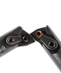 Two dark metal 5/8 in x 7 in indexable turning boring bars with orange carbide inserts for metal lathe turning.