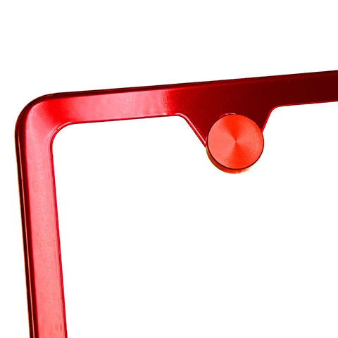 Close-up of red aluminum cap from Badass Stainless Steel License Plate Screws With Twist On Red Caps for all weather protection.