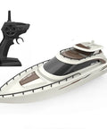 Remote Control Boat 4CH Electric RC Watercraft Yacht Style Sail Cruiser For Lake And Pool with controller visible.